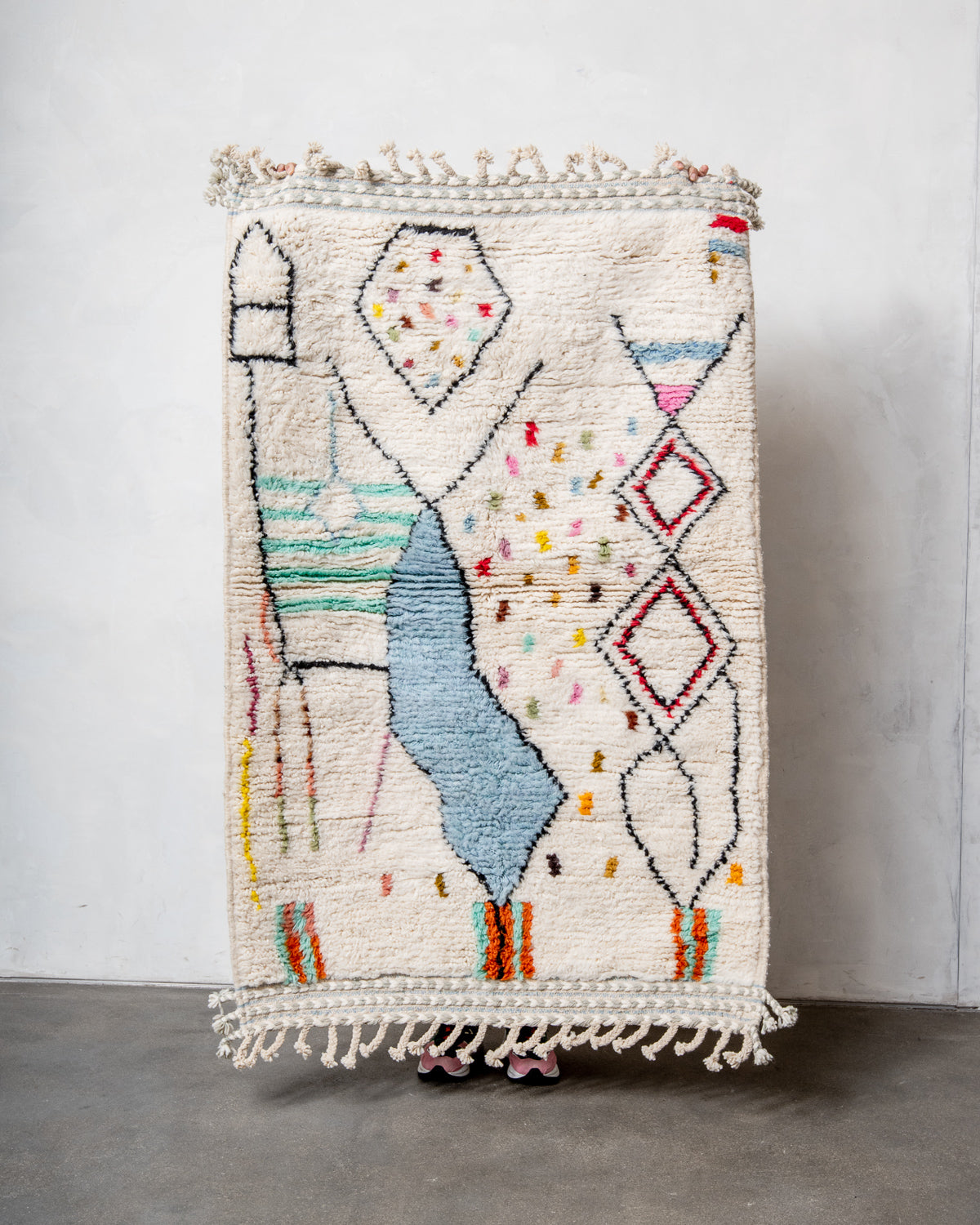 Modern, designer, handcrafted Berber rug from Morocco. Beniourain carpet with beautiful colours and patterns and fluffy wool texture.
